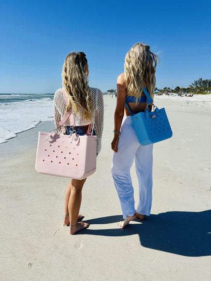 Quinn - Rose Our Maxi and Midi size backpack with our Quinn Freedom Strap System in sky blue and light pink.